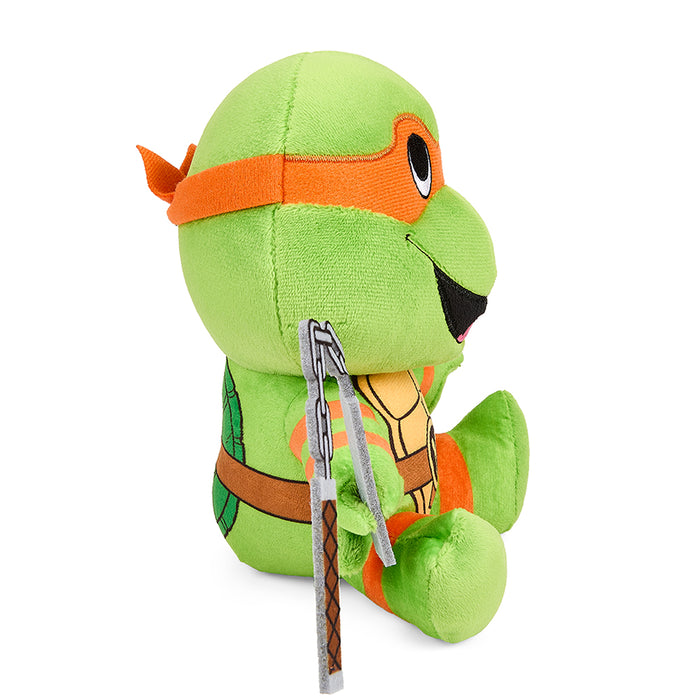 Teenage Mutant Ninja Turtles Michelangelo 7.5-inch Phunny plush toy, detailed cartoon character with orange mask and ninja gear.