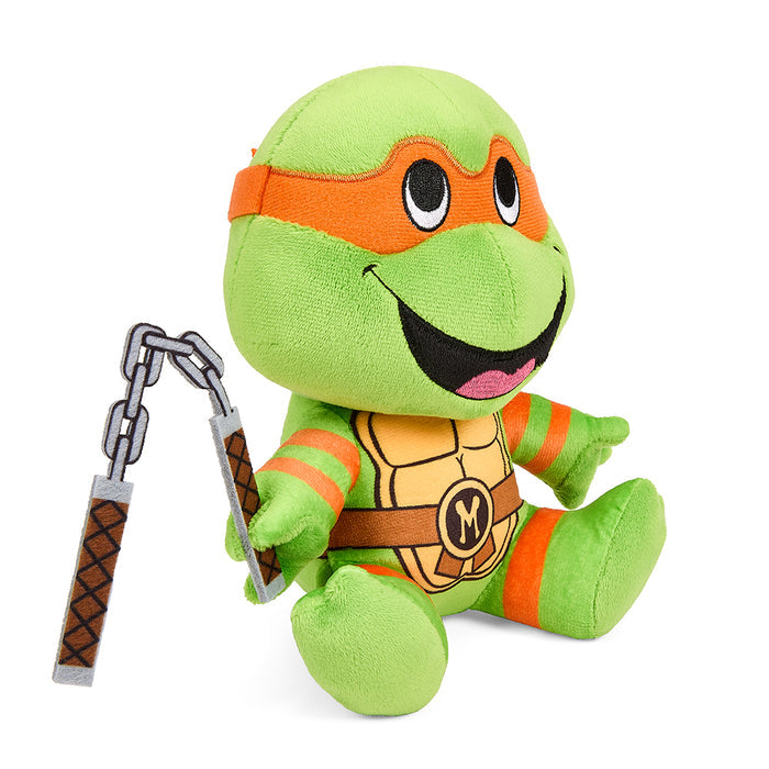 Teenage Mutant Ninja Turtles Michelangelo 7.5-inch Phunny plush toy with bright orange mask and soft fabric, detailed turtle character.