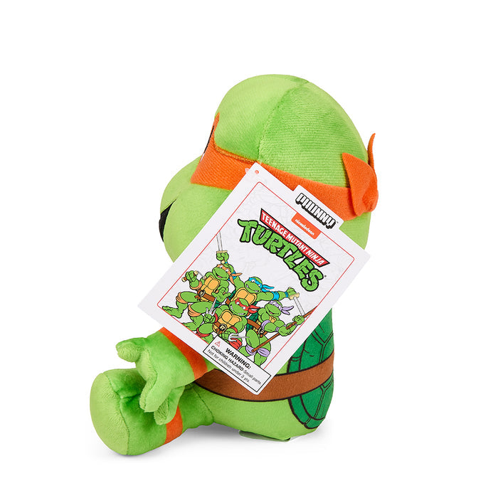 Teenage Mutant Ninja Turtles 7.5-inch Michelangelo Phunny plush toy with orange mask and playful expression.