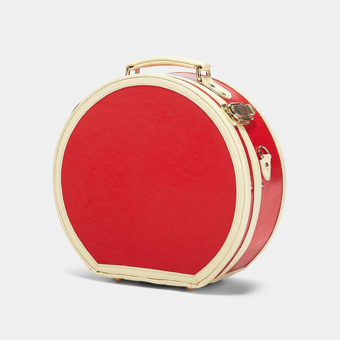 Angled product view of the small hatbox Entrepreneur vegan leather suitcase in lipstick red