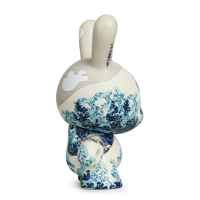 The Met 3-Inch Showpiece Dunny featuring Hokusai's Great Wave design, detailed collectible toy with vibrant blue wave artwork.