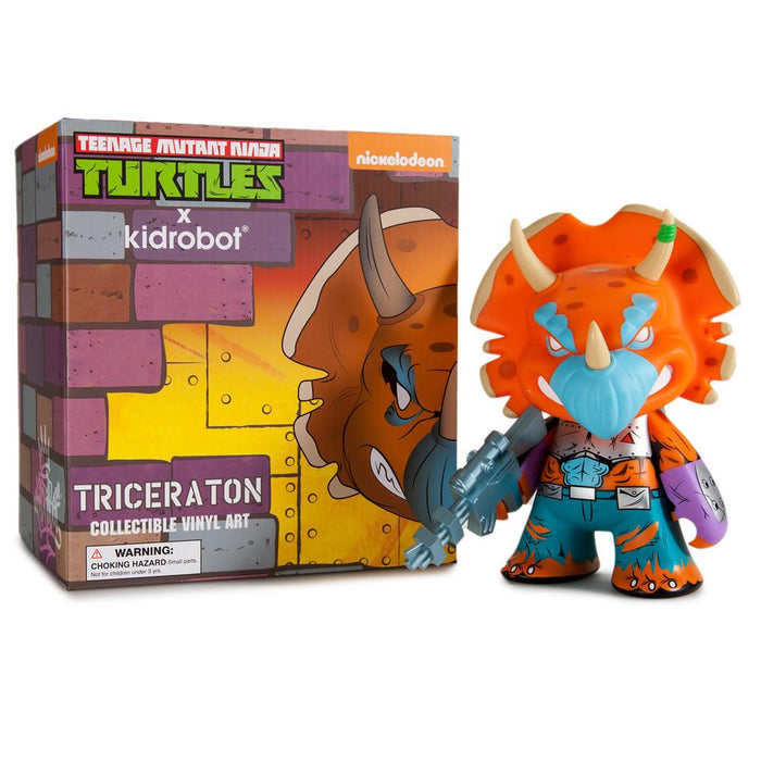 Teenage Mutant Ninja Turtles TMNT Triceraton 7-inch vinyl art figure by Kidrobot in orange edition, detailed character pose.