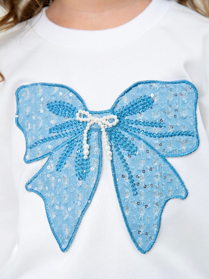 Trendy girls sweatshirt and jean set with oversized bow design