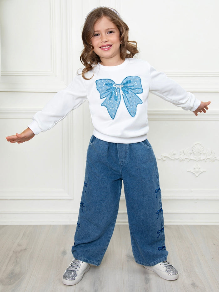 Stylish girls wide leg jeans with coordinating bow sweatshirt