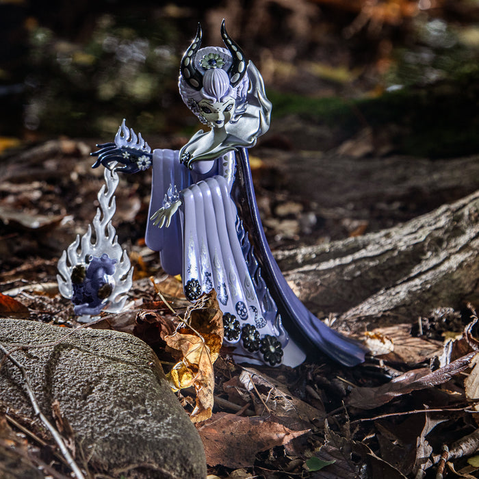 Limited edition Witch Queen 8-inch vinyl art figure by Junko Mizuno in violet, designed by Kidrobot, with intricate details.