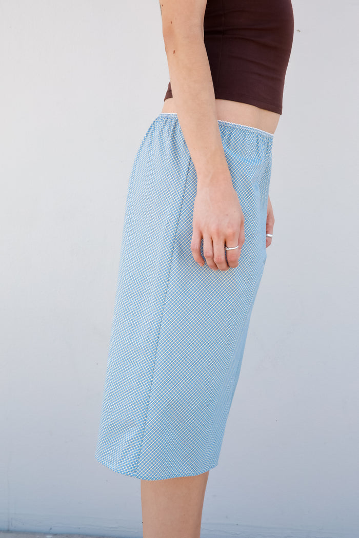WOVEN BIAS MIDI SLIP SKIRT IN CAPRI