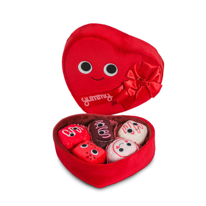 Yummy World Amore plush toy resembling a heart-shaped box of chocolates with interactive features, soft and colorful.