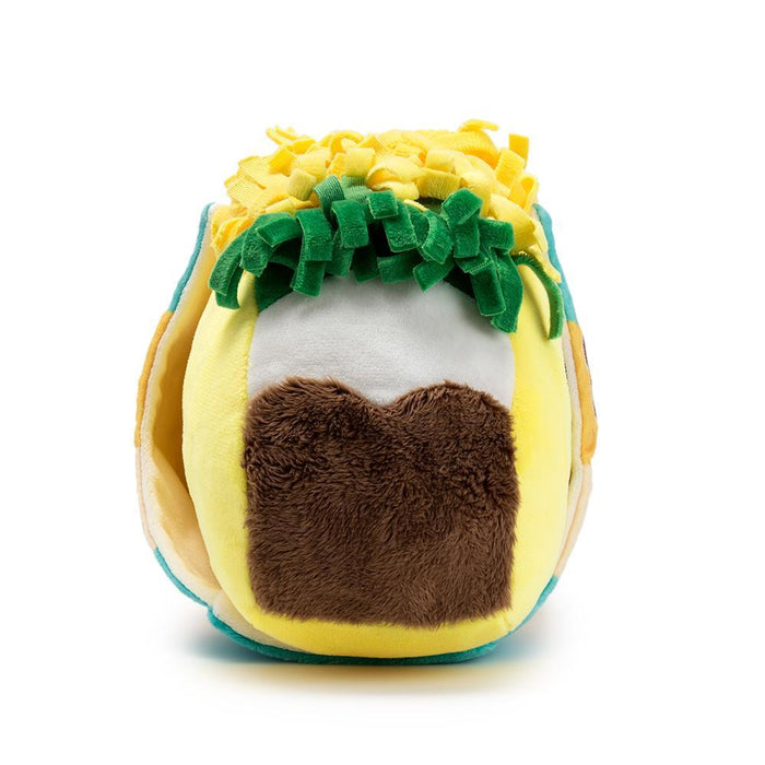 Yummy World Flaco Taco medium plush toy featuring a colorful taco character with a smiling face and soft fabric texture.