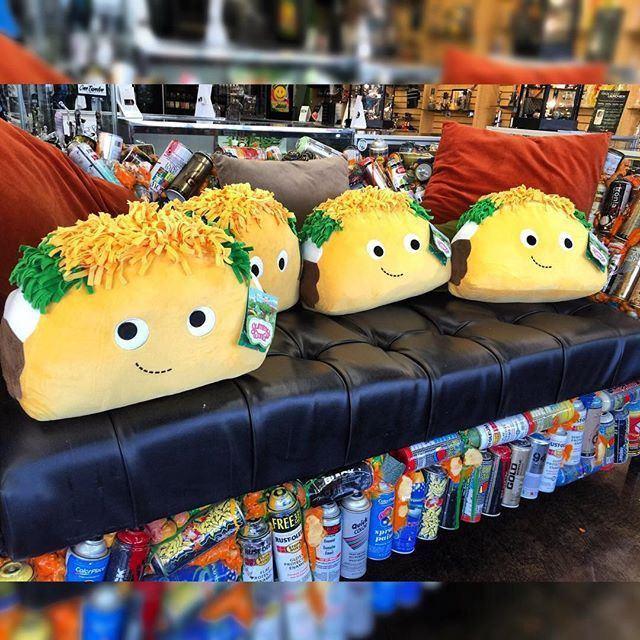 Large Flaco Taco plush toy from Yummy World by Kidrobot featuring a soft, colorful taco character with smiling face.